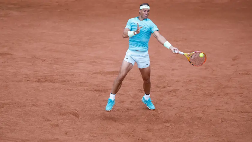 epa11481690 Rafael Nadal of Spain in action during his men's singles first round match against Leo Borg of Sweden during the Nordea Open Tennis tournament in Bastad, Sweden, 16 July 2024. EPA/Adam Ihse SWEDEN OUT