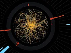 epa03294845 An undated handout computer genenrated image provided by CERN shows Real CMS proton-proton collision events in which 4 high energy electrons (green lines and red towers) are observed in a 2011 event. The event shows characteristics expected from the decay of a Higgs boson but is also consistent with background Standard Model physics processes. ATLAS and CMS experiments presented their latest preliminary results in the search for the long sought Higgs particle in a press conference at the CERN in Geneva, Switzerland, 04 July 2012. Both experiments observe a new particle in the mass region around 125-126 GeV. The results presented have been labelled as preliminary. They are based on data collected in 2011 and 2012, with the 2012 data still under analysis. EPA/CERN HANDOUT MANDATORY CREDIT HANDOUT EDITORIAL USE ONLY/NO SALES