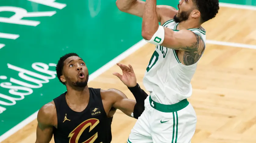 epa11330439 Boston Celtics forward Jayson Tatum (R) in action with Cleveland Cavaliers guard Donovan Mitchell during the first half of the NBA Eastern Conference Semifinal game two between the Boston Celtics and the Cleveland Cavaliers in Boston, Massachusetts, USA, 09 May 2024. The Boston Celtics lead the best of seven series 1-0. EPA/CJ GUNTHER SHUTTERSTOCK OUT