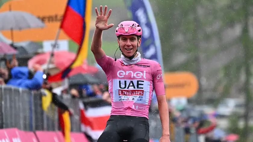 Slovenian rider Tadej Pogacar of Uae Team Emirates celebrates after crossing the finish line and win the 16th stage of the 107 Giro d'Italia 2024, cycling race over 202 km from Livigno to Santa Cristina Valgardena, Italy, 21 May 2024. ANSA/LUCA ZENNARO