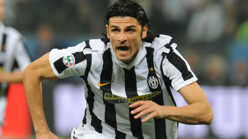 20090924 GENOVA -SPO- CAMPIONATO DI CALCIO SERIE A GENOA-JUVENTUS. Il giocatore Vincenzo Iaquinta della Juventus esulta dopo avere segnato il gol questa sera 24 settembre 2009 allo stadio Luigi Ferraris di Genova...ANSA/LUCA ZENNARO/DC
