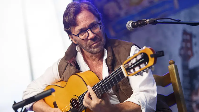 epa06763741 US guitarist Al Di Meola performs during his concert at the three-day cultural festival entitled Orvenyeshegyi Piknik near Zalacsany, Hungary, 25 May 2018. EPA/GYORGY VARGA HUNGARY OUT
