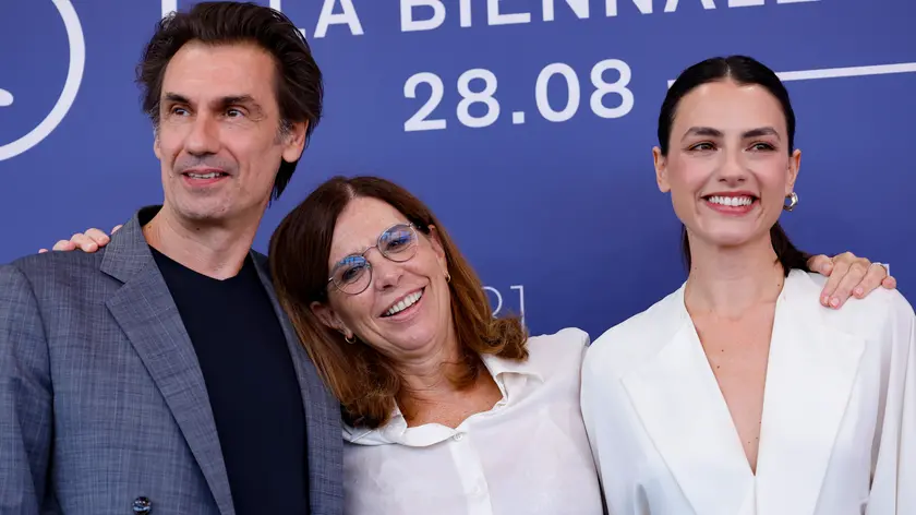 Francesca Comencini (C), Fabrizio Gifuni, Romana Maggiora Vergano (R) pose at a photocall of ‘Il Tempo che ci vuole (The time it takes)’ at the 81st annual Venice International Film Festival, in Venice, Italy, 06 September 2024. The movie is presented out of competition at the festival running from 28 August to 07 September 2024. ANSA/FABIO FRUSTACI