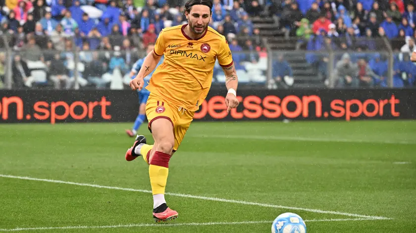 Filippo Pittarello in campo a Como (foto Editoriale Report)
