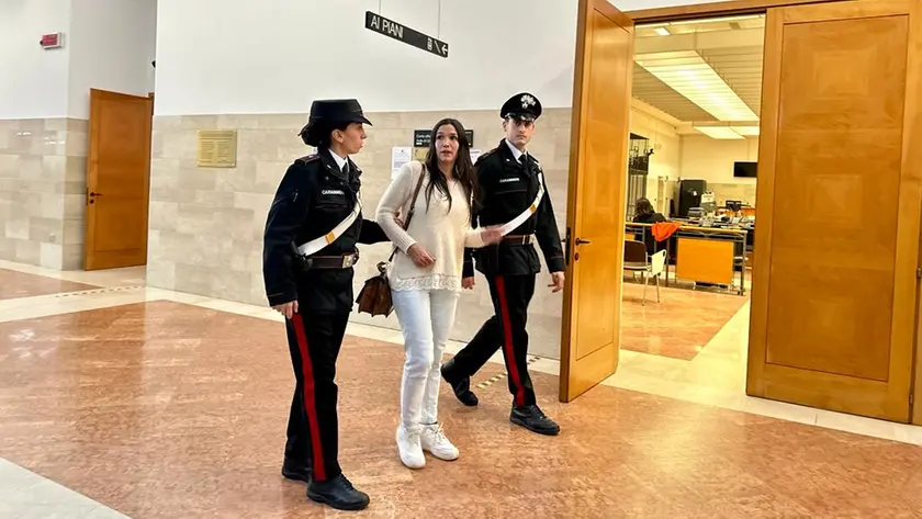 Valentina Boscaro, 32 anni, entra nell'aula della Corte d'Assise per ascoltare la sentenza (Foto Agenzia Bianchi)