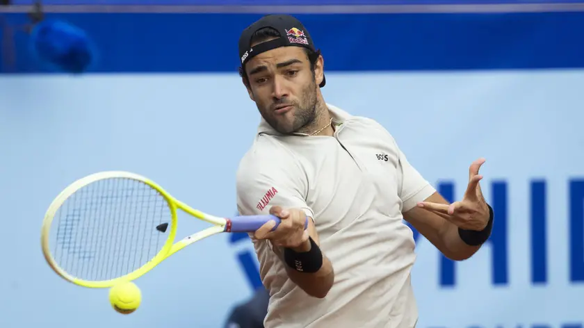 epa11490031 Matteo Berrettini of Italy in action during the final match against Quentin Halys of France at the Swiss Open tennis tournament in Gstaad, Switzerland, 21 July 2024. EPA/PETER KLAUNZER
