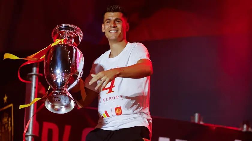 epa11480645 Spain's national soccer team captain Alvaro Morata celebrates the UEFA EURO 2024 victory at the Cibeles square in Madrid, Spain, 15 July 2024. Spain defeated England by 2-1 in the final of the 2024 European Championship in Germany on 14 July 2024. EPA/JP GANDUL
