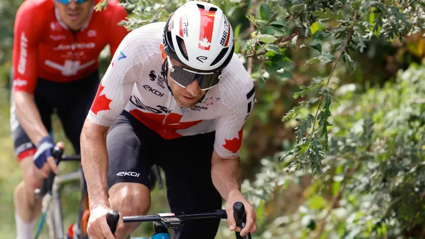 epa11573612 Canadian rider Michael Woods of Israel Premier Tech team competes during the thirteenth stage of the La Vuelta a Espana cycling race over 176km from Lugo to Puerto de Ancares, Spain, 30 August 2024. EPA/JAVIER LIZON