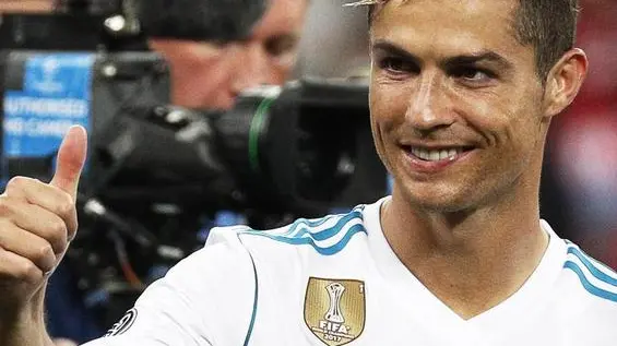 epa06765918 Real Madrid's Cristiano Ronaldo celebrates after the UEFA Champions League final between Real Madrid and Liverpool FC at the NSC Olimpiyskiy stadium in Kiev, Ukraine, 26 May 2018. Real Madrid won 3-1. EPA/SERGEY DOLZHENKO