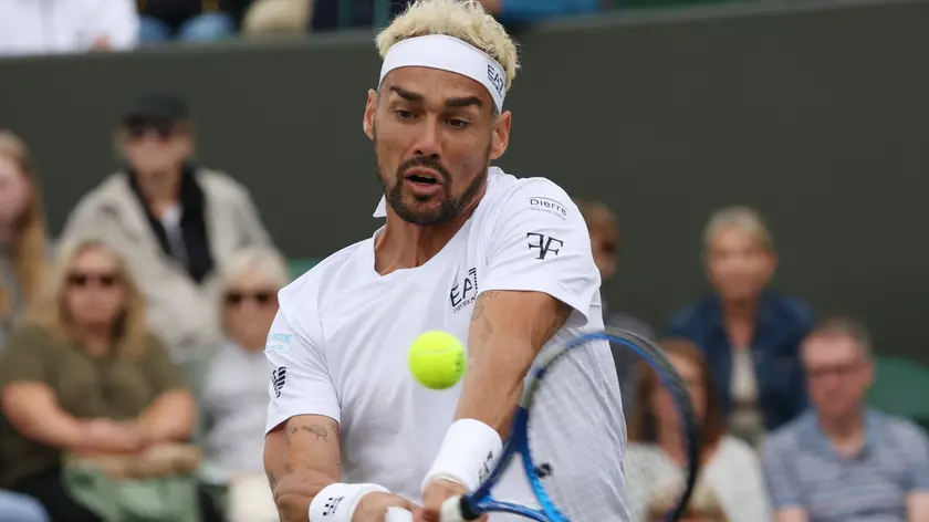 epa11454662 Fabio Fognini in action during his Men's Singles 2nd round match against Casper Ruud of Norway at the Wimbledon Championships, Wimbledon, Britain, 03 July 2024. EPA/TIM IRELAND EDITORIAL USE ONLY