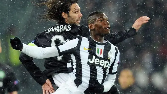 Paul Pogba (R) of Juventus and Giorgos Samaras of Celtic in action during the Uefa Champions League soccer match Juventus FC vs Celtic Glasgow at Juventus Stadium in Turin, Italy, 06 March 2013. ANSA/DI MARCO