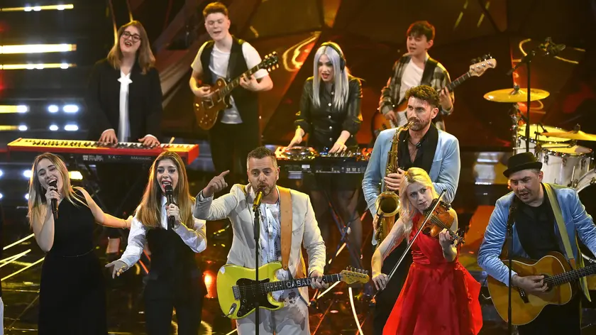 The Orchestra Casadei and Nuova Orchesta Santa Balera perform on stage at the Ariston theatre during the 74th Sanremo Italian Song Festival in Sanremo, Italy, 07 February 2024. The music festival runs from 06 to 10 February 2024. ANSA/RICCARDO ANTIMIANI