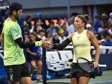 Andrea Vavassori and teammate Sara Errani high-five during a mixed doubles match at the 2024 US Open on Sunday, Sep. 1, 2024 in Flushing, NY. (Andrew Ong/USTA)