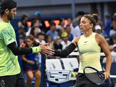 Andrea Vavassori and teammate Sara Errani high-five during a mixed doubles match at the 2024 US Open on Sunday, Sep. 1, 2024 in Flushing, NY. (Andrew Ong/USTA)