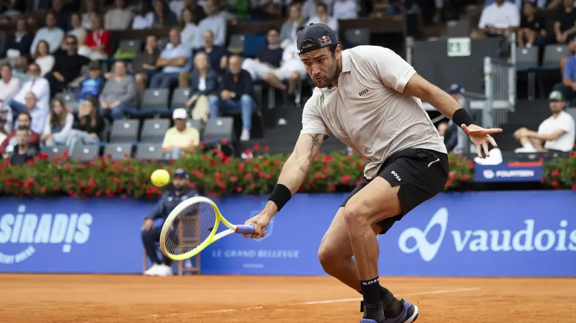 epa11490022 Matteo Berrettini of Italy in action during the final match against Quentin Halys of France at the Swiss Open tennis tournament in Gstaad, Switzerland, 21 July 2024. EPA/PETER KLAUNZER