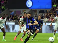 Inter Milan’s Hakan Calhanoglu scores on penalty goal of 2 to 1 during the Italian serie A soccer match between Fc Inter and Cagliari at Giuseppe Meazza stadium in Milan, 14 April 2024. ANSA / MATTEO BAZZI