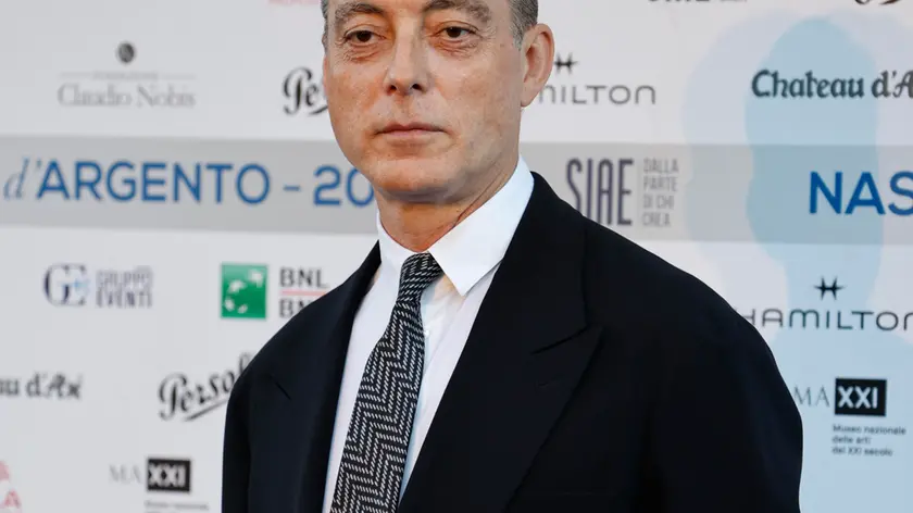 epa11442097 Italian actor Maurizio Lombardi poses prior to the 'Nastri d'Argento' Award (Silver Ribbon) 2024 ceremony at the MAXXI - National Museum of 21st Century Art in Rome, Italy, 27 June 2024. The awards are presented annually by Sindacato Nazionale dei Giornalisti Cinematografici Italiani (SNGCI), the association of Italian film critics. EPA/FABIO FRUSTACI