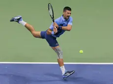 epa11570413 Novak Djokovic of Serbia returns the ball to Laslo Djere of Serbia during their second round match of the US Open Tennis Championships at the USTA Billie Jean King National Tennis Center in Flushing Meadows, New York, USA, 28 August 2024. The US Open tournament runs from 26 August through 08 September. EPA/BRIAN HIRSCHFELD