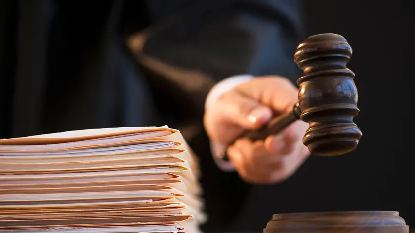 Judge holding gavel, close-up