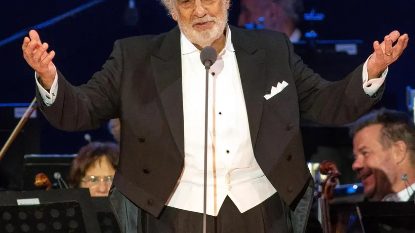 (FILE) - Spanish opera singer Placido Domingo performs as part of the inauguratation ceremony of the Szent Gellert Forum youth sports complex of the local Catholic diocese in Szeged, southern Hungary, 28 August 2019 (Reissued 24 September 2019). According to reports on 24 September 2019, Spanish tenor Placido Domingo withdrew from all future performances at the Metropolitan Opera in New York following sexual harassment allegations. ANSA/TIBOR ROSTA HUNGARY OUT *** Local Caption *** 55424284