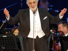 (FILE) - Spanish opera singer Placido Domingo performs as part of the inauguratation ceremony of the Szent Gellert Forum youth sports complex of the local Catholic diocese in Szeged, southern Hungary, 28 August 2019 (Reissued 24 September 2019). According to reports on 24 September 2019, Spanish tenor Placido Domingo withdrew from all future performances at the Metropolitan Opera in New York following sexual harassment allegations. ANSA/TIBOR ROSTA HUNGARY OUT *** Local Caption *** 55424284