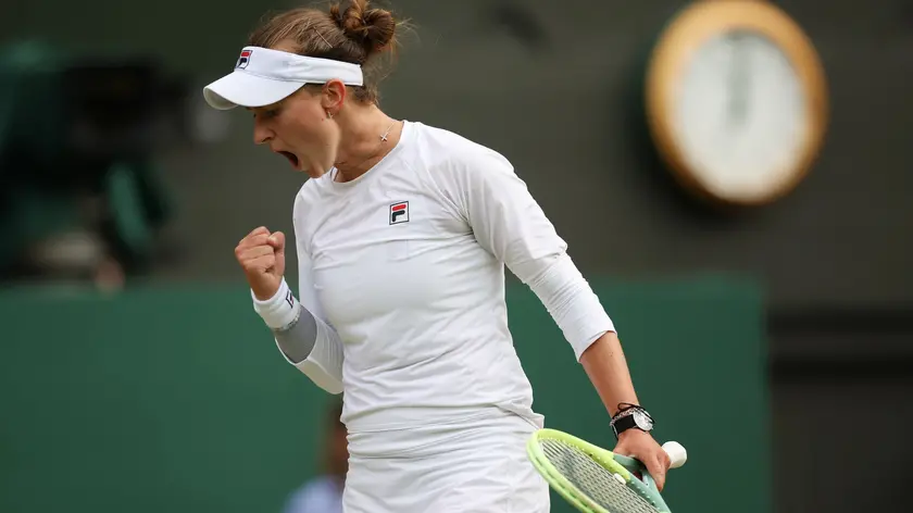 epa11473016 Barbora Krejcikova of Czech Republic in action during her Women's Singles semi-finals match against Elena Rybakina of Kazakhstan at the Wimbledon Championships, in Wimbledon, London, Britain, 11 July 2024. EPA/ADAM VAUGHAN EDITORIAL USE ONLY