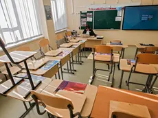 epa08302817 A school teacher holds a distance education lesson in No 1298 secondary school in Moscow, Russia, 18 March 2020. In line with measures aimed at preventing the spread of the Covid-19 and coronavirus, Moscow schools have implemented flexible attendance starting from 16 March 2020. Parents decide themselves if their child continues to attend classes at school or stay at home. For those who stay at home schools support of distance education. EPA/SERGEI ILNITSKY