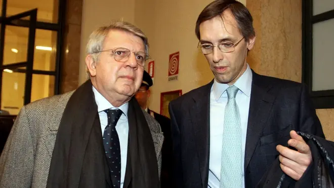 Gli avvocati Niccolo' Ghedini (d) e Piero Longo, difensori del presidente del Consiglio Silvio Berlusconi in un'immagine dell' 11 marzo 2011. ANSA / STEFANO PORTA